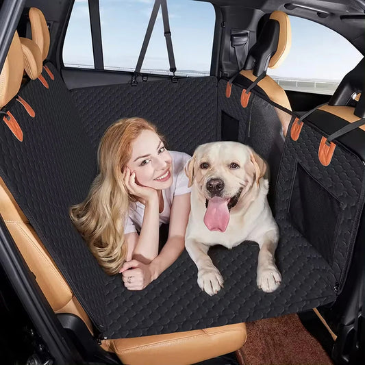 Woman and dog on a car seat cover in a vehicle